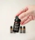 Hand Holding MScents Luminous Bloom Pure Essential Oil