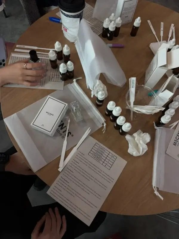 Small bottles of perfume on the table were used for a masterclass
